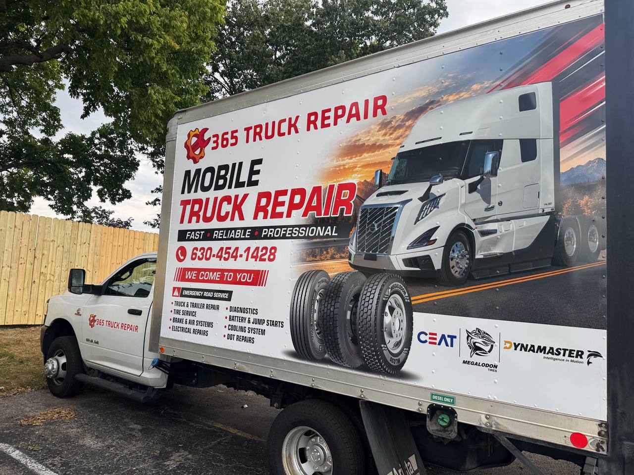 Opposite side of the 365 Truck Repair mobile truck showing its repair-service graphics and cab